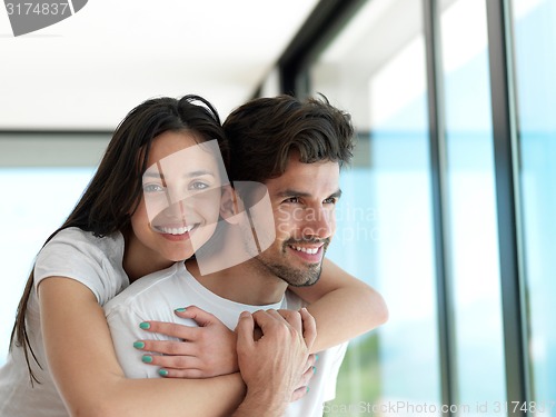 Image of relaxed young couple at home