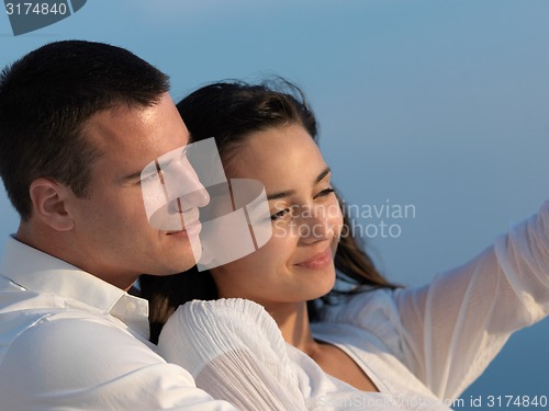 Image of happy young romantic couple have fun arelax  relax at home