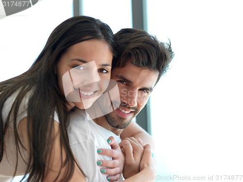 Image of relaxed young couple at home