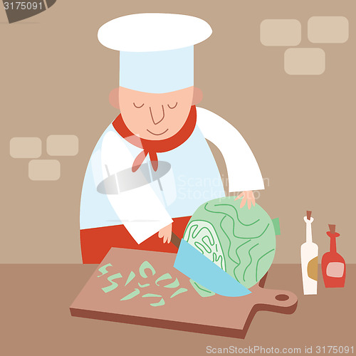 Image of Cook shreds cabbage restaurant kitchen