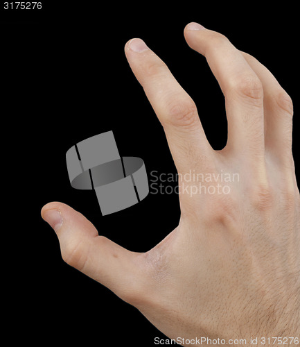 Image of White hand on black