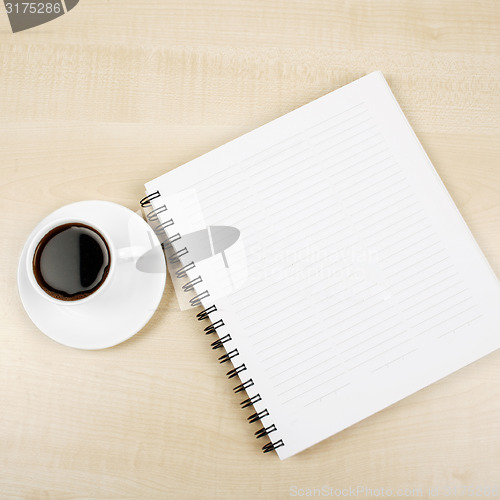 Image of White cup and white page