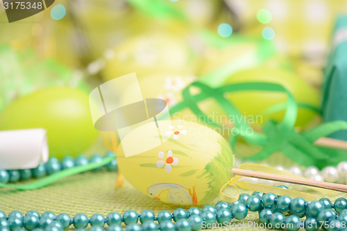Image of Easter background with eggs, ribbons and spring decoration