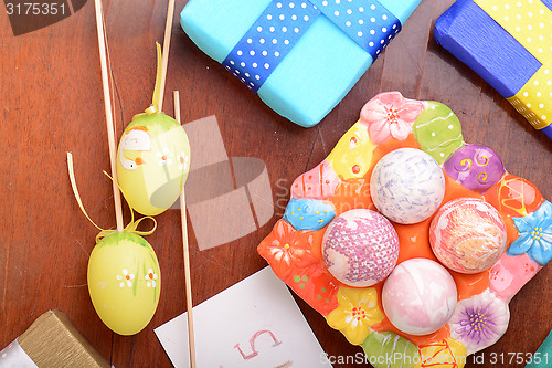 Image of Easter background with eggs and gift box