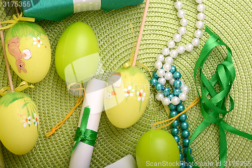 Image of Easter setting with gift box and spring decoration