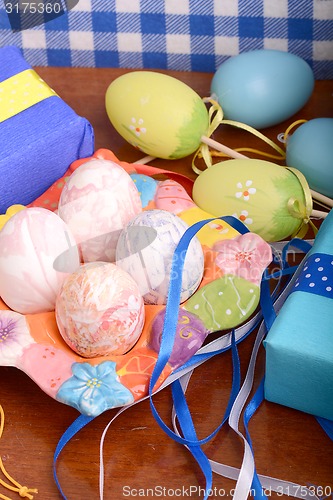 Image of Easter background with eggs and gift box