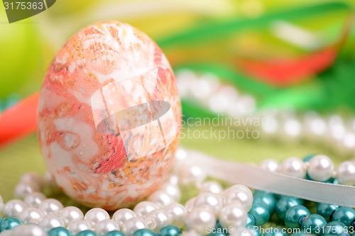 Image of Easter setting with gift box and spring decoration