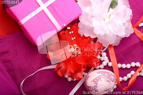 Image of Easter setting with gift box and spring decoration