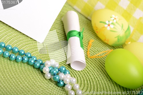 Image of Easter setting with gift box and spring decoration