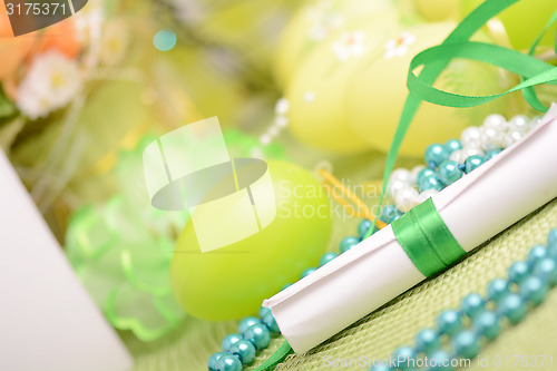 Image of Easter background with eggs, ribbons and spring decoration