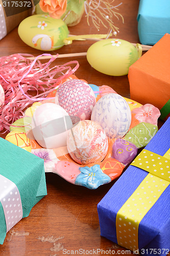 Image of Easter background with eggs and gift box