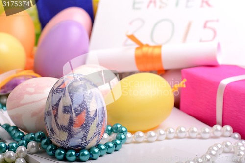 Image of Easter setting with gift box and spring decoration