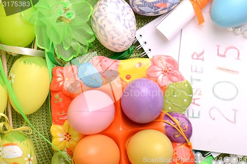 Image of Easter setting with gift box and spring decoration