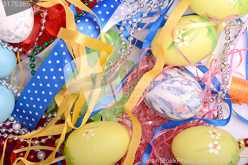 Image of Easter background with eggs, ribbons and spring decoration