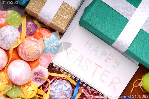 Image of Easter background with eggs and gift box