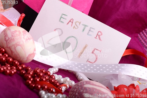 Image of Easter setting with gift box and spring decoration