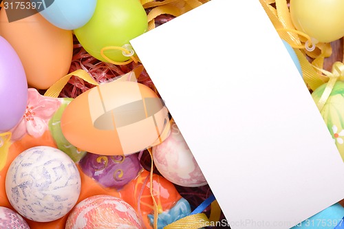Image of Easter setting with gift box and spring decoration