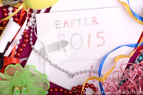 Image of Easter setting with gift box and spring decoration