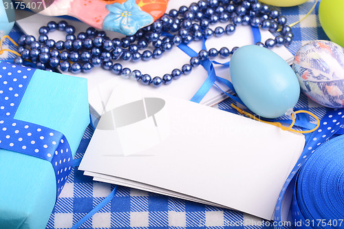 Image of Easter background with eggs, ribbons and spring decoration