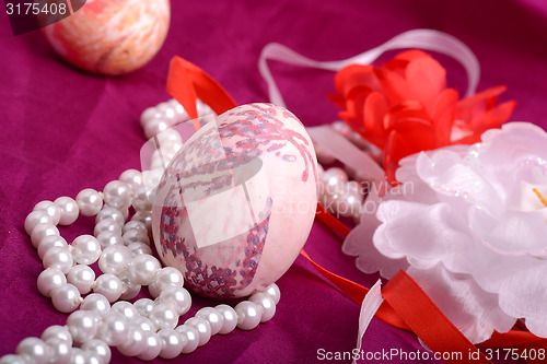 Image of Easter background with eggs, ribbons and spring decoration