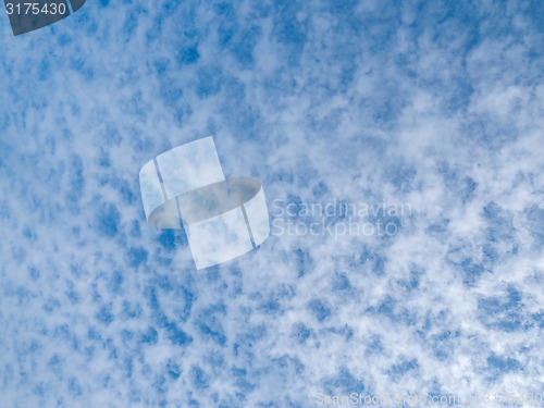 Image of Lots of cloud dots on a partly cloudy blue sky