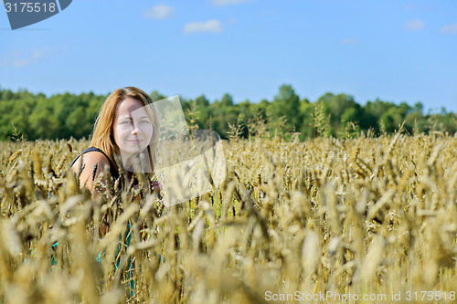 Image of Portrait of woman in field