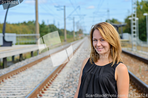 Image of Portrait of female on the railway