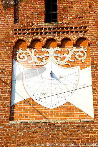 Image of  old   sunny clock  closed brick tower   italy  lombardy   