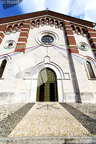 Image of  church  in  the varano borghi  old  brick tower sidewalk italy 