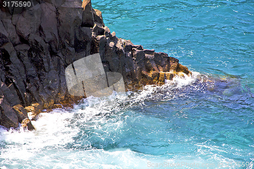 Image of hervideros brown rock in white coast lanzarote   