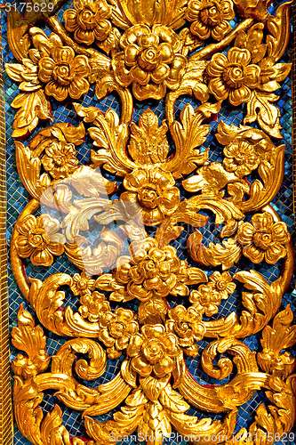 Image of window   in  gold    temple    bangkok  flower  of the temple 