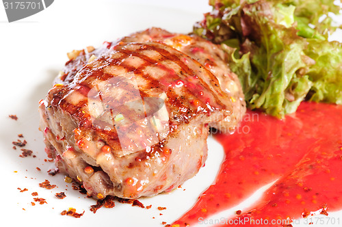 Image of Grilled steaks and vegetable salad