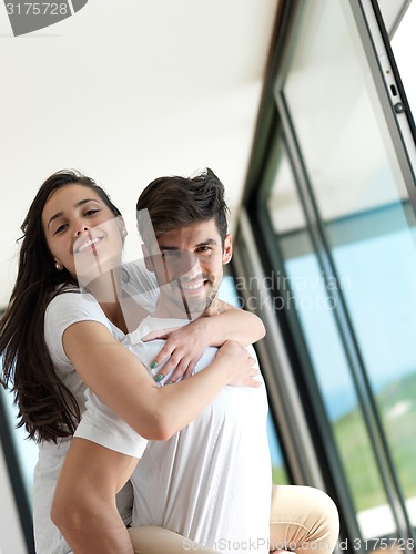 Image of relaxed young couple at home