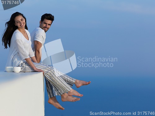 Image of happy young romantic couple have fun arelax  relax at home