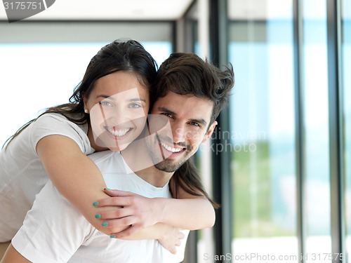 Image of relaxed young couple at home