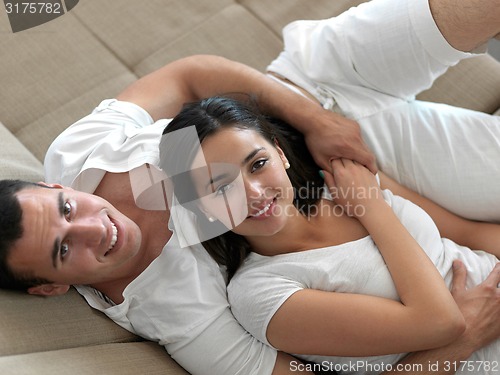 Image of relaxed young couple at home