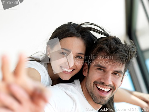 Image of relaxed young couple at home
