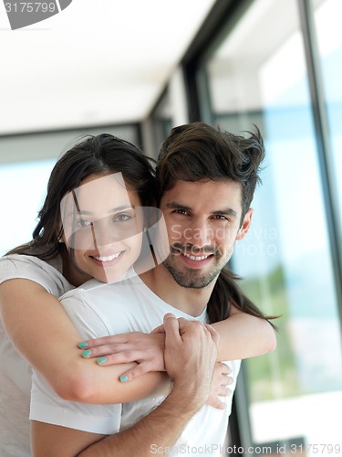 Image of relaxed young couple at home