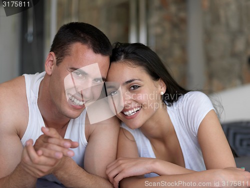 Image of couple relax and have fun in bed