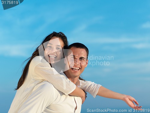 Image of happy young romantic couple have fun arelax  relax at home