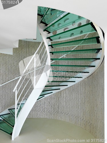 Image of modern glass spiral staircase