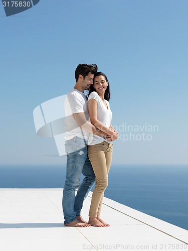 Image of happy young romantic couple have fun arelax  relax at home