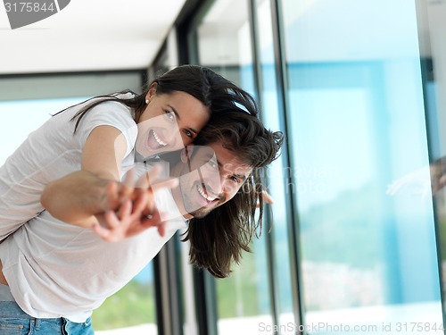 Image of relaxed young couple at home