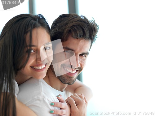 Image of relaxed young couple at home