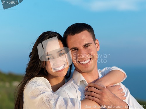 Image of happy young romantic couple have fun arelax  relax at home