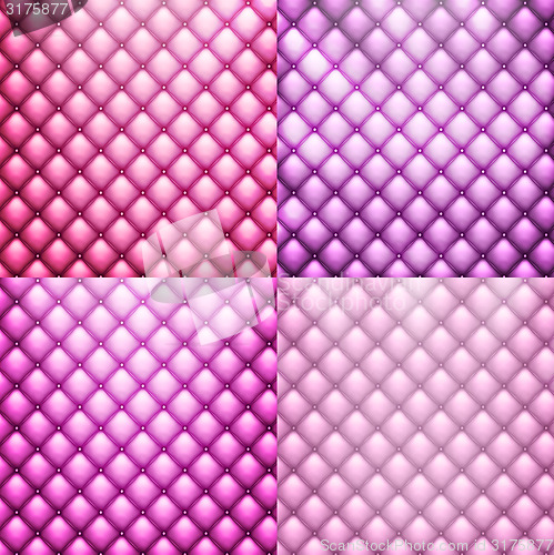 Image of Pink leather furniture with buttons.