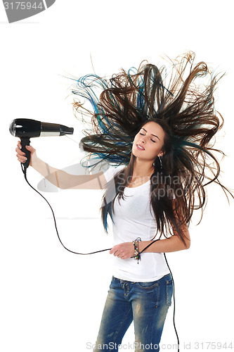 Image of Female drying her hair with hair-drier