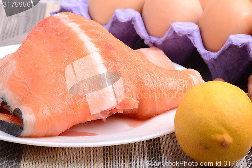 Image of Slice of red fish salmon with fruits