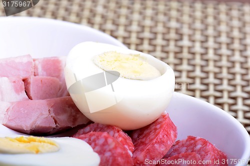 Image of slices of salame from tuscany and egg