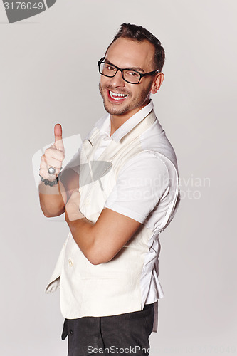 Image of Man gesturing thumb up